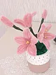 solmayan-dekoratif-mini-saksili-sonil-el-orgusu-cicek-pembe